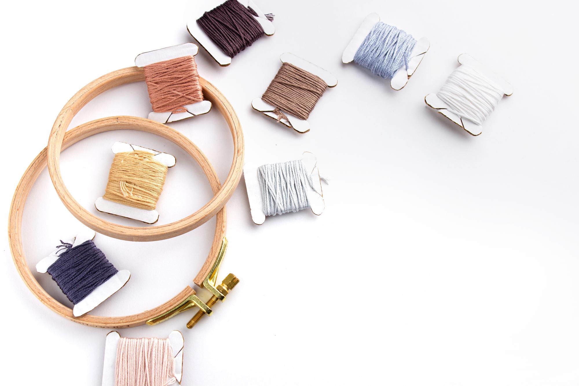 selection of completed embroidered samples on display